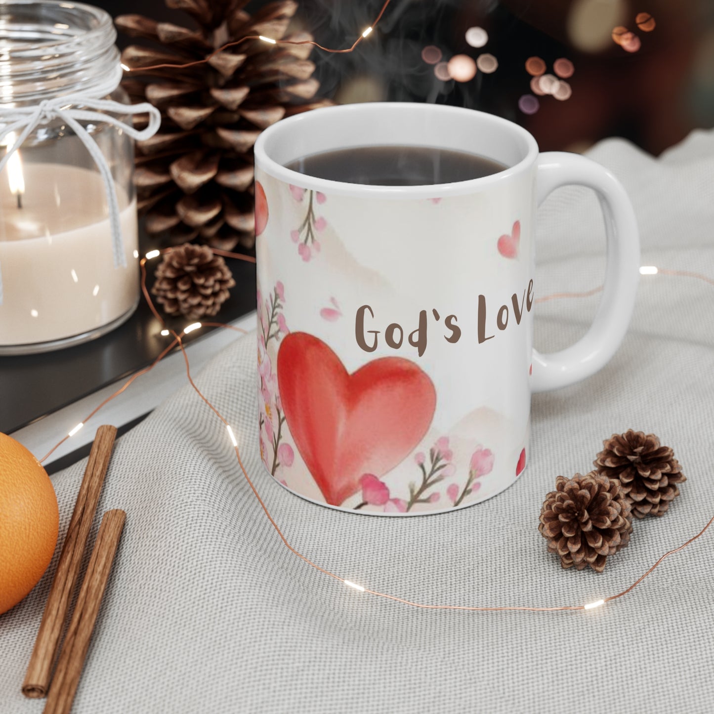 White mug with 'Grip Mood' text on a table with decorative items