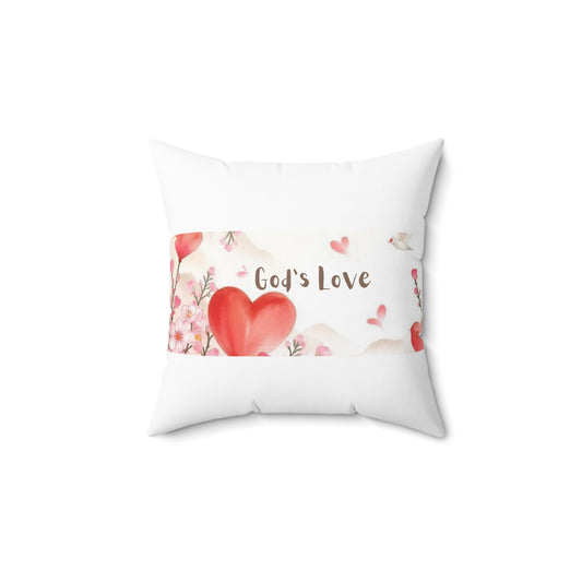 Decorative pillow with a heart design and 'God's Love' text on a white background